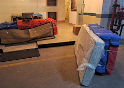 Professional furniture packing with bubble wrap by Trusted Packers and Movers before shifting.